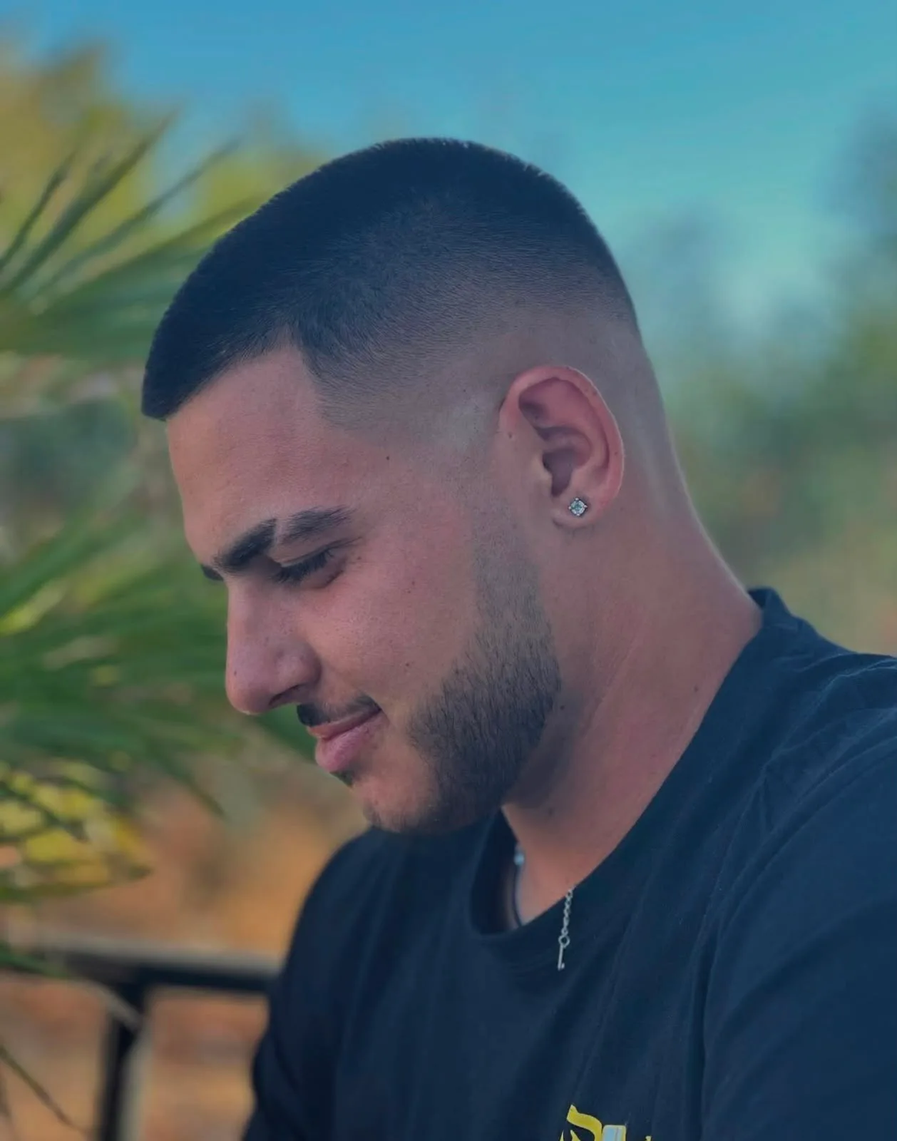 A short haircut with a defined hairline