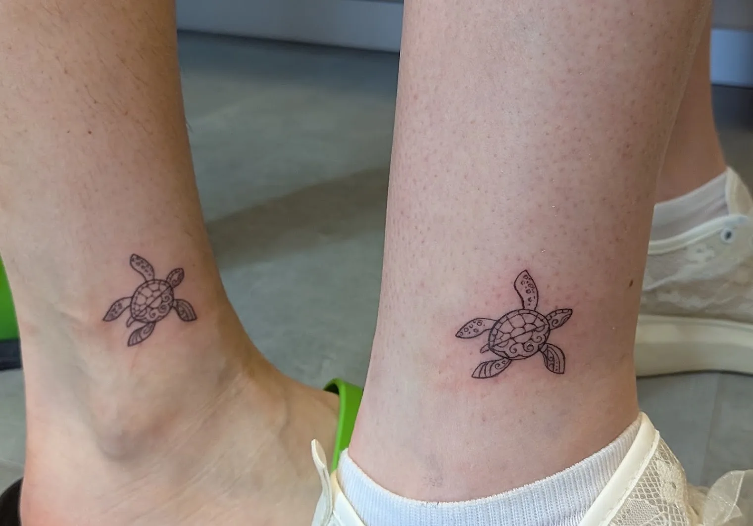 Matching turtle tattoos